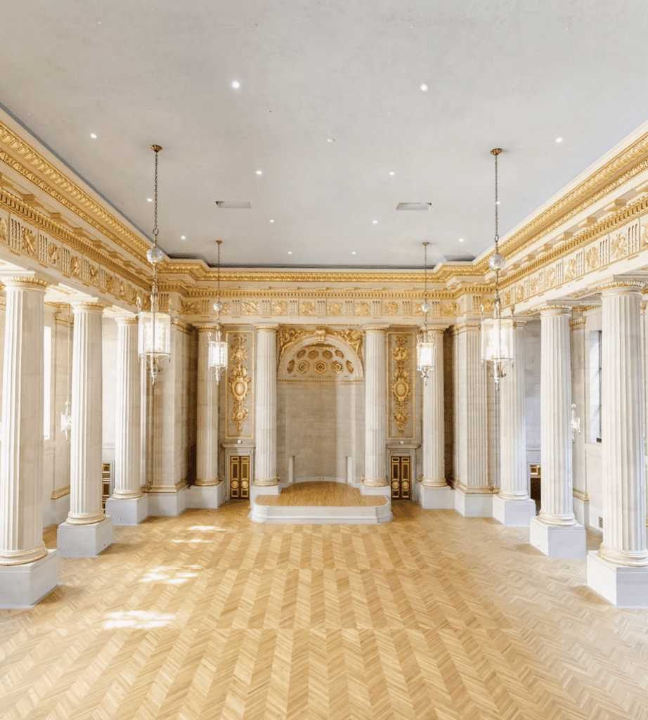A dramatic wedding setup at Andrew W Mellon Auditorium showcasing towering columns and historic architecture in Washington DC